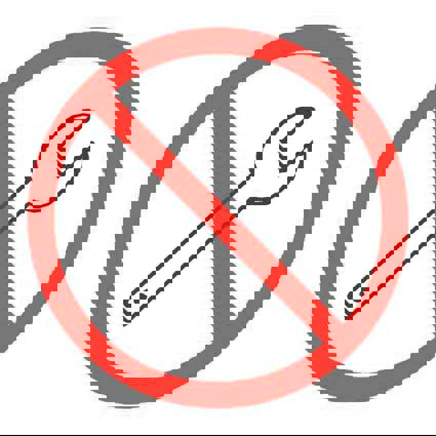 Een verbodspictogram met daarin een moersleutel afgebeeld. 