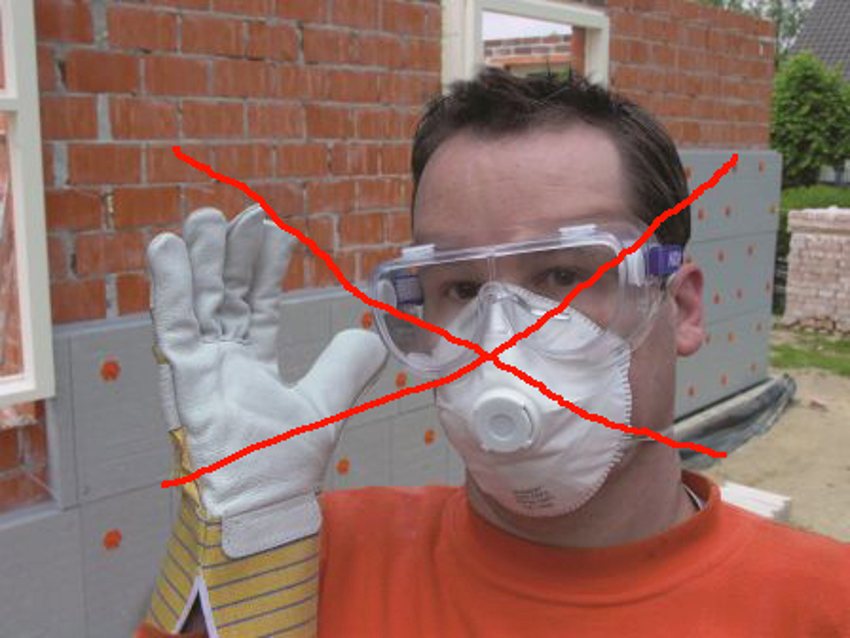 Foto van een verwerker met diverse beschermingsmiddelen aan en door de foto een groot rood kruis. 